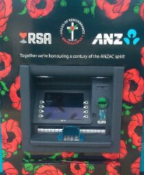 ANZ Bank ATM decorated with red poppies.